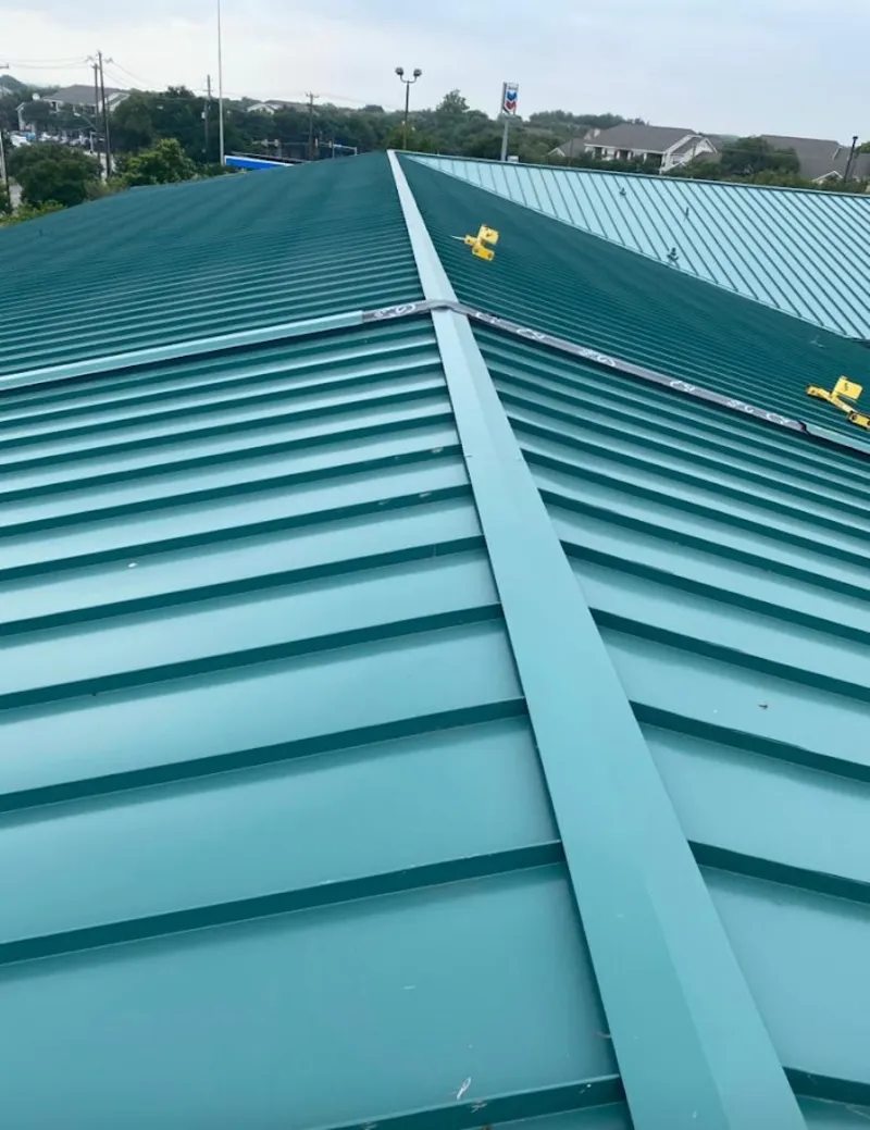 Green commercial metal roof ridge and valley for Metal Roof Repair in Prineville