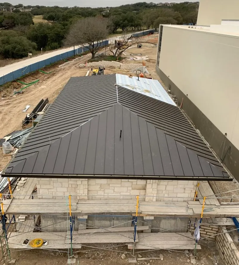 Metal roof new construction with scaffolding in Prineville